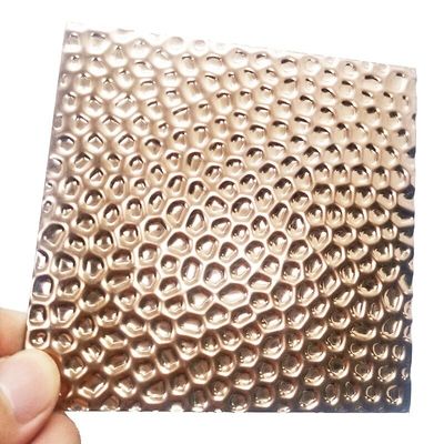 Rose Gold Mirror Honeycomb Estampado 304 Hoja de acero inoxidable para aplicaciones decorativas de paredes y techos